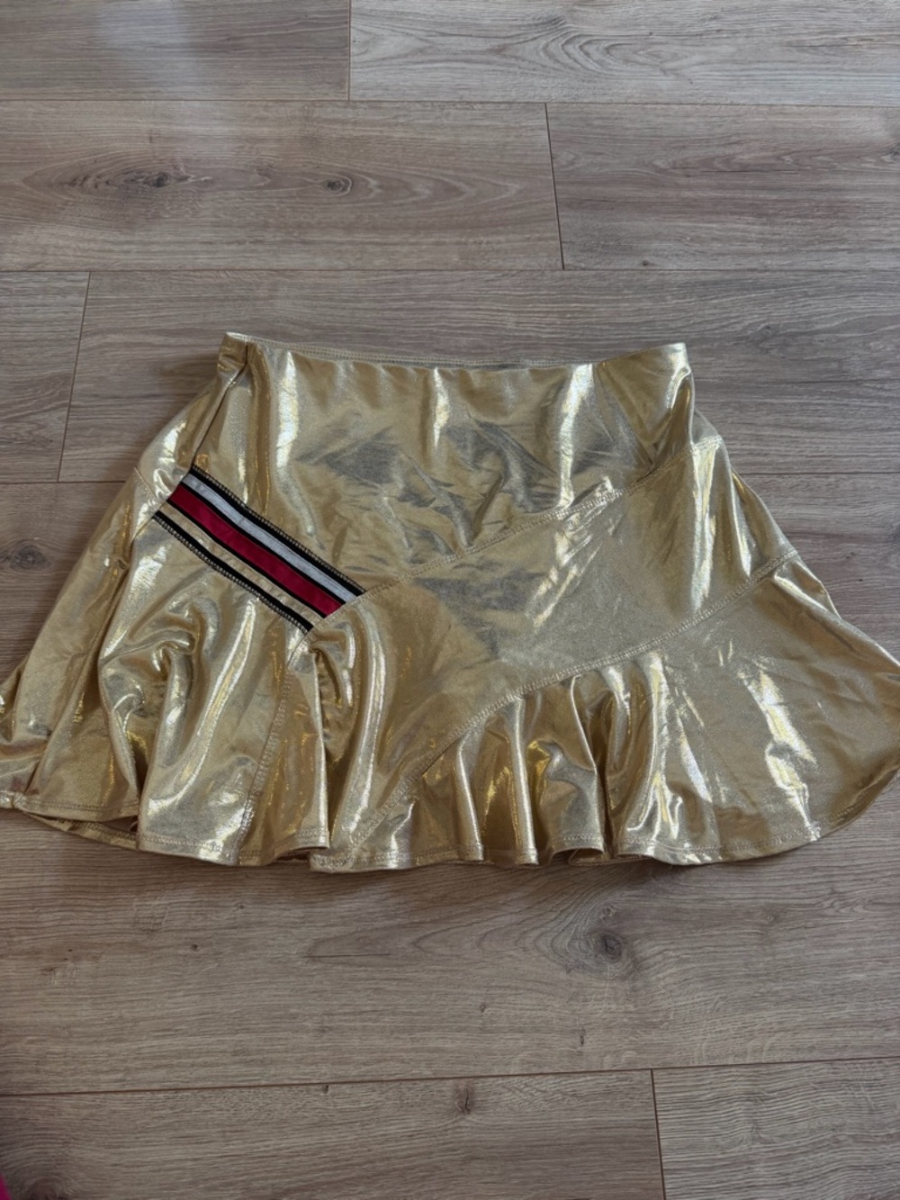Lucky In Love Tennis Skirt in Metallic Gold with Stripe Detail